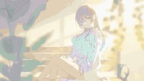 a girl is sitting on a bench with her legs crossed in front of a plant .