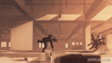 a gif from gifrun.com shows a man falling from a chair