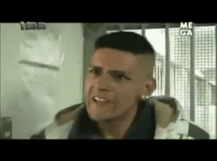 a man is making a funny face in a video .