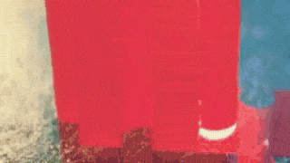 a close up of a red building with the word tia on it