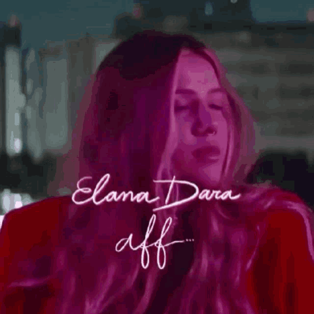 a close up of a woman with the name elana dara written on it