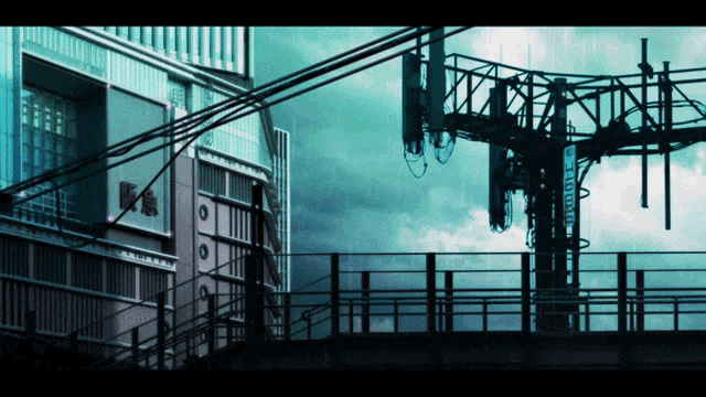 a building with chinese writing on it is surrounded by wires