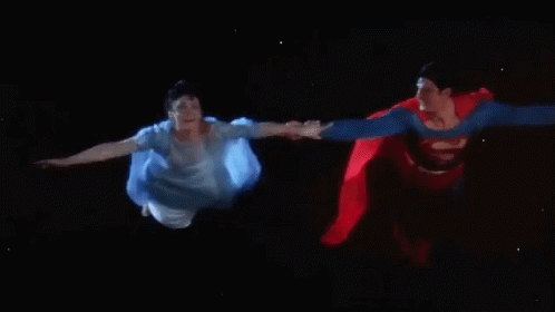 Superman Flying With Lois - Superman GIF - Superman Clark Kent Lois Lane GIFs
