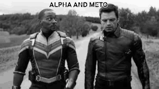a black and white photo of two men standing next to each other on a dirt road .
