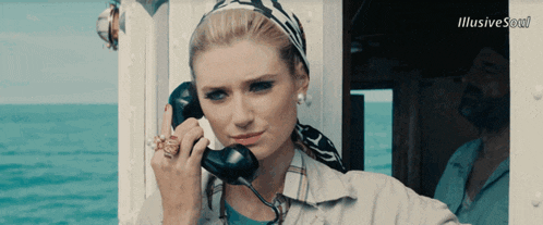 a woman is talking on a phone with the words illusive soul behind her