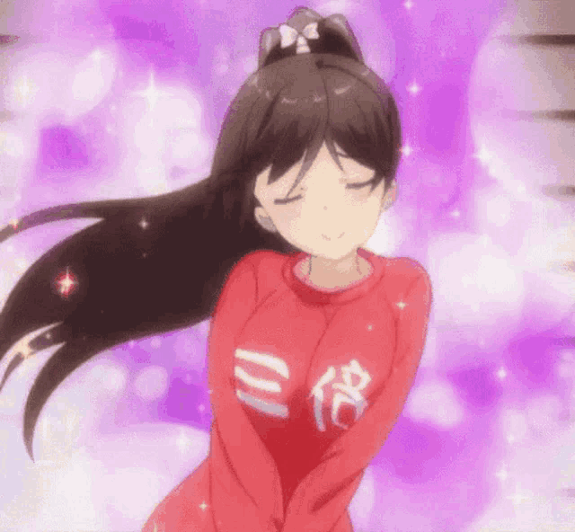 a girl in a red sweater with chinese writing on her chest