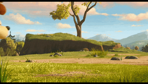 a cartoon scene with a tree and rocks in the background