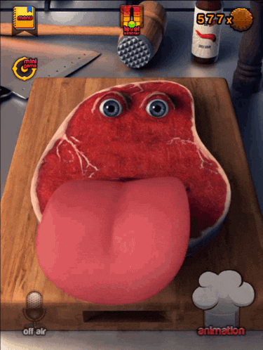 a cutting board with a piece of meat with its tongue out