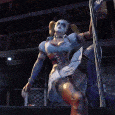 harley quinn is sitting on a rope with her hand outstretched