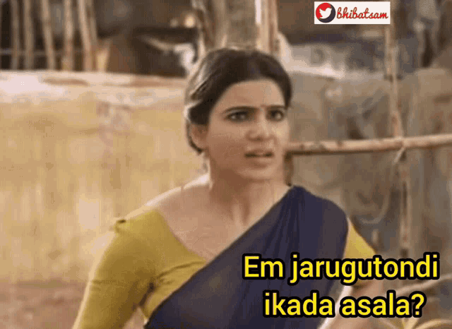 a woman in a blue and yellow blouse with the words em jarugutondan ikada asala