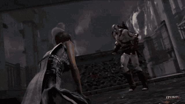 a video game screen shows a man holding a woman in his arms with the word izuni on the bottom right