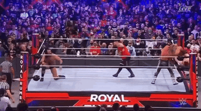 a wrestling match is taking place in a ring with the word royal on it