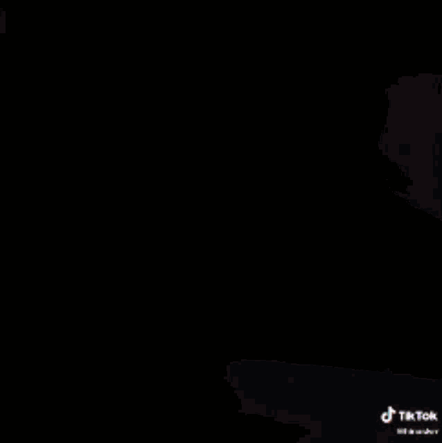 a close up of a person 's face with a tik tok watermark