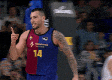 a basketball player wearing a number 14 jersey