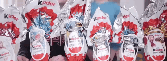 a bunch of kinder eggs wrapped in aluminum foil