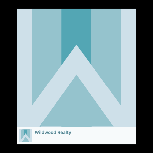 a logo for wildwood realty with a triangle in the center