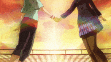 a boy and a girl are holding hands in front of a cloudy sky