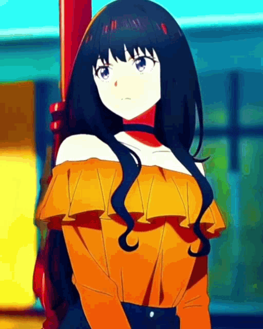 a girl with long black hair and blue eyes is wearing a yellow off the shoulder top and jeans .