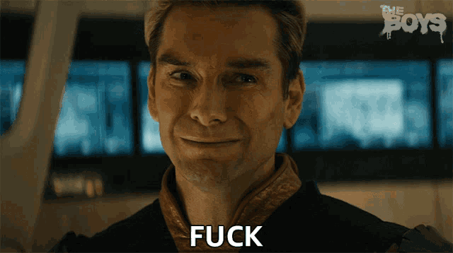a close up of a man 's face with the word fuck on the bottom