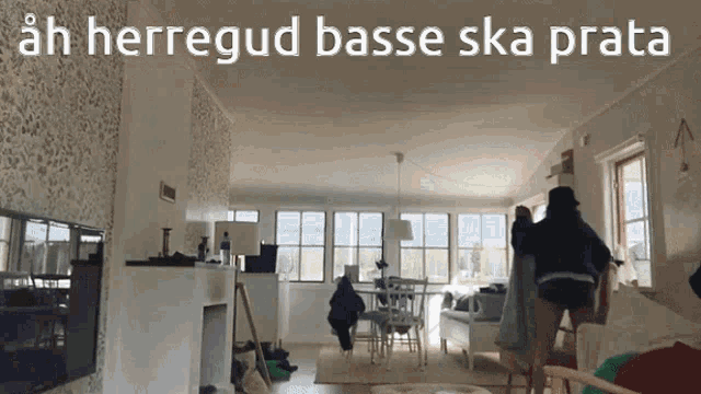 a living room with the words ah herregud basse ska prata