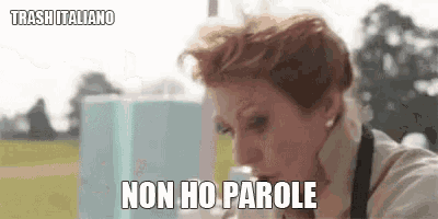 a woman is drinking from a can and says non ho parole