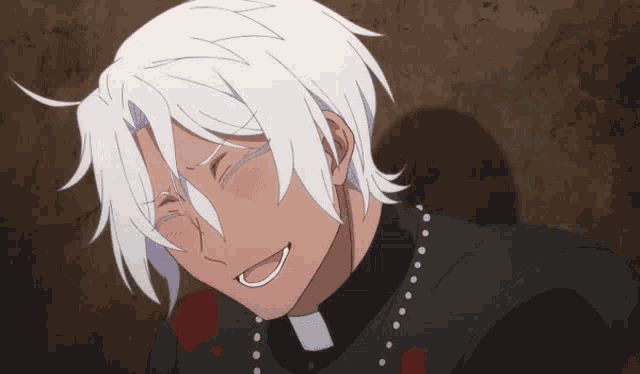 a man with white hair and a priest 's robe is smiling .