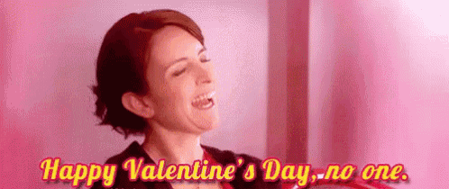 a woman is laughing and saying `` happy valentine 's day ... no one . ''