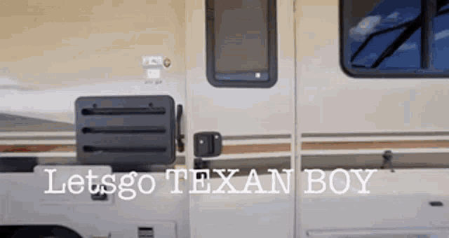 a picture of a rv with the words letsgo texan boy on it