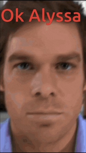 a close up of a man 's face with the words " ok alyssa " above it