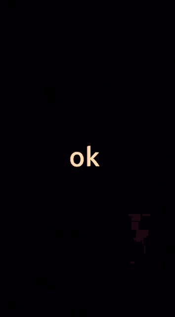 a blurry picture of a man with the words ok on it .
