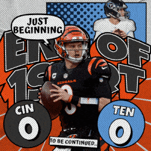 a bengals player is holding a football in his hand