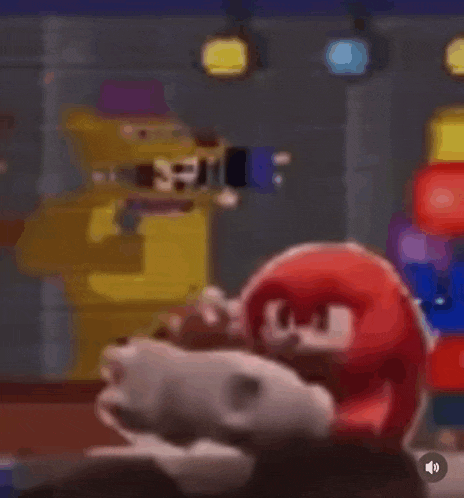 a cartoon character is sitting on a table in a room with a bunch of balloons .