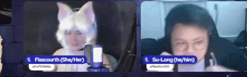 a woman in a cat costume is sitting next to a man in a headphones .