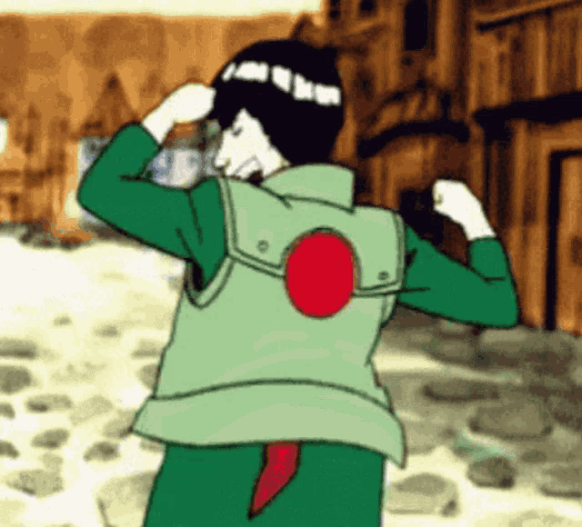 a man in a green vest with a red circle on the back is flexing his muscles