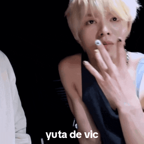 a close up of a person 's hand with the words yuta de vic written on it .