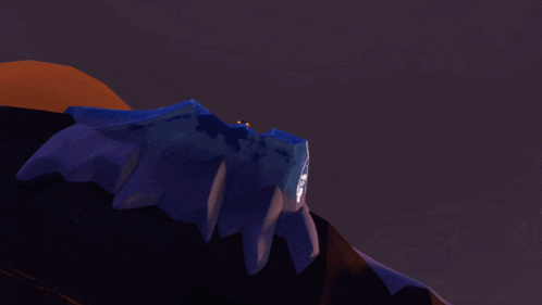 a lego figure laying on a blue surface with mountains in the background