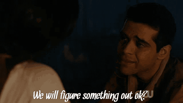 a man and a woman are looking at each other and the words we will figure something out ok