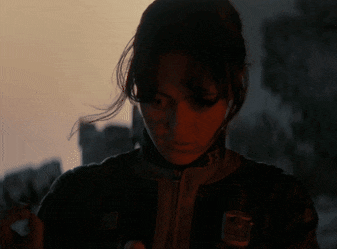 a woman wearing a jacket with a patch on it that says ' u.s. air force '
