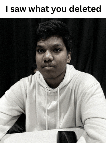 a black and white photo of a young man with a caption that says i saw what you deleted
