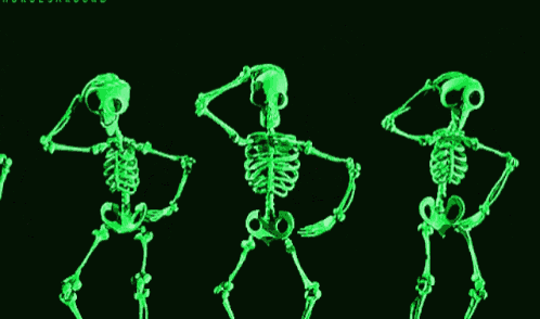 glow in the dark skeletons are dancing in a dark room
