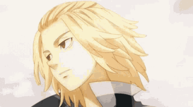 a close up of a person with blonde hair
