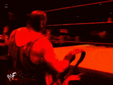 a wrestling ring with a w logo on the back of the ring