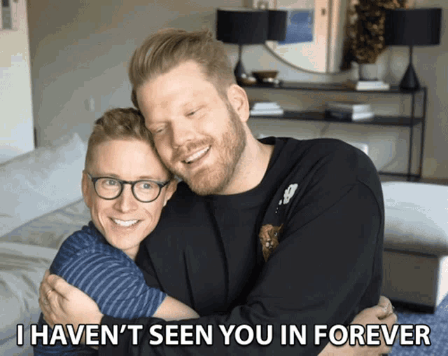 two men hugging each other with the caption i haven t seen you in forever