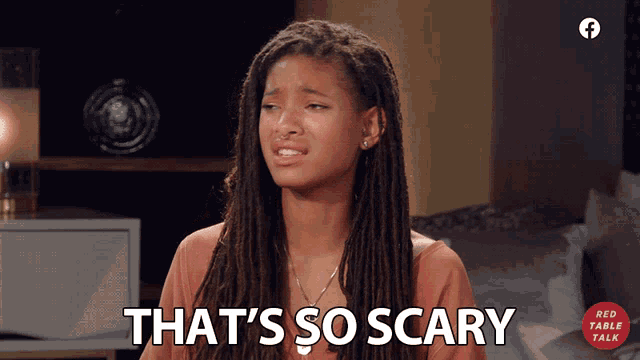 a woman with dreadlocks says that 's so scary in front of a red table talk logo