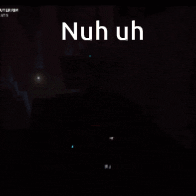 a dark room with the words nuh uh written in white letters