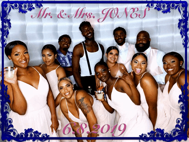 a group of people posing for a picture with the date of 6 8 2019