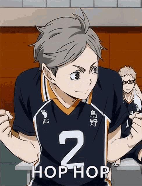 a volleyball player with the number 2 on their jersey