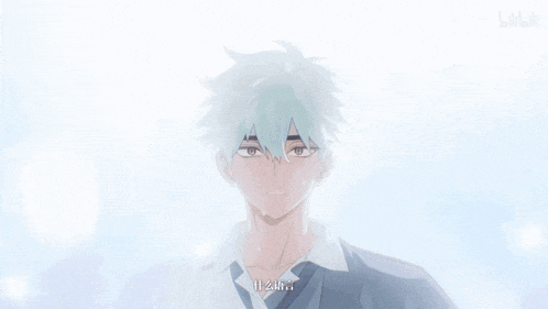 a blurry picture of a boy with chinese writing on the bottom right