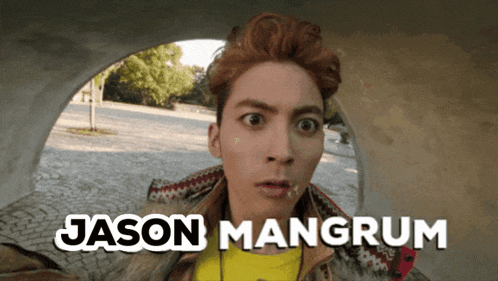 a man with red hair and the name jason mangrum on the bottom