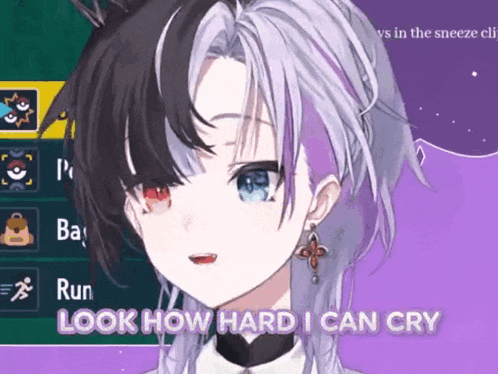 a girl with purple and black hair is talking about how hard she can cry